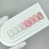 Baza hybrydowa NAILSOFTHEDAY Cover NEW Formula Milk 06 mleczna z niebieskim brokatem, 10 ml - Фото №2