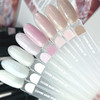 Baza hybrydowa NAILSOFTHEDAY Cover NEW Formula Milk 06 mleczna z niebieskim brokatem, 10 ml - Фото №3