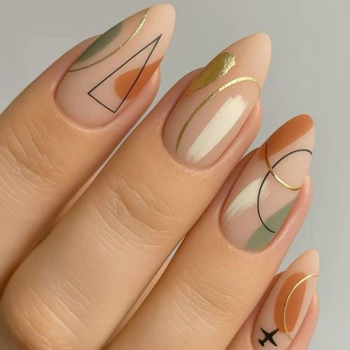Jesienny manicure z wzorami geometrycznymi i złotymi akcentami