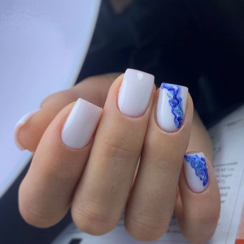 Milky manicure with blue