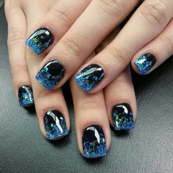 Black manicure (with blue glitter)