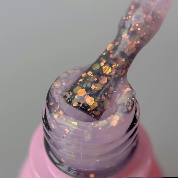 Lakier hybrydowy Toki-Toki Unicorn UN05 półprzezroczysty liliowy z brokatem 5 ml - Фото №2
