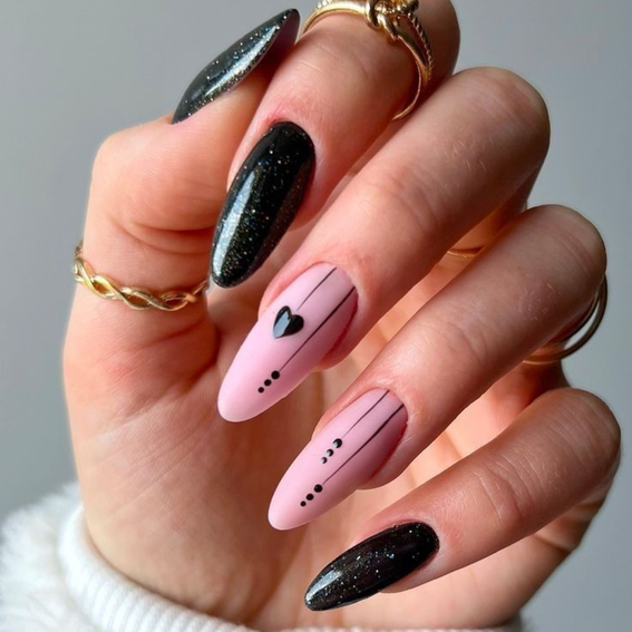 Black and pink nails with design