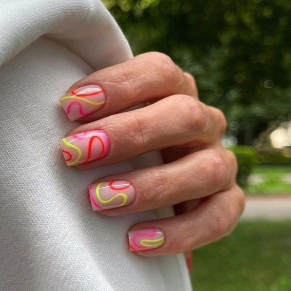 Bright manicure with abstract lines